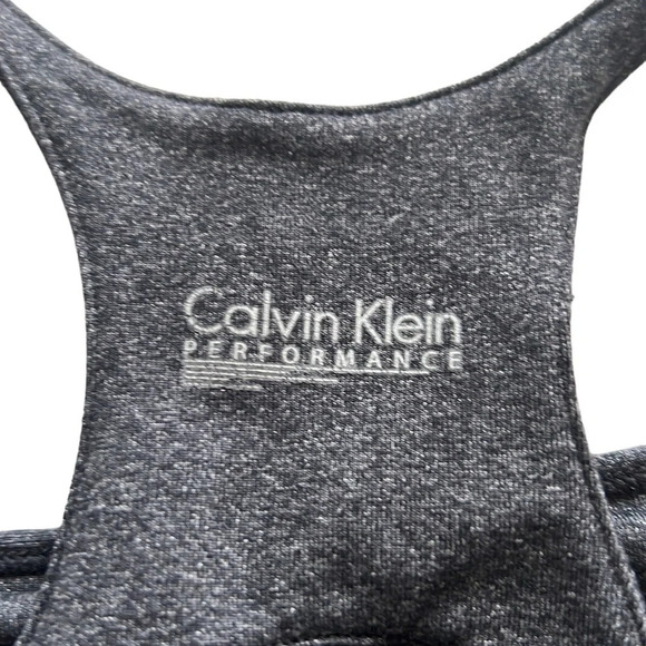 Calvin Klein sports athletic top with built in bra. Quick dry. - Picture 9 of 13